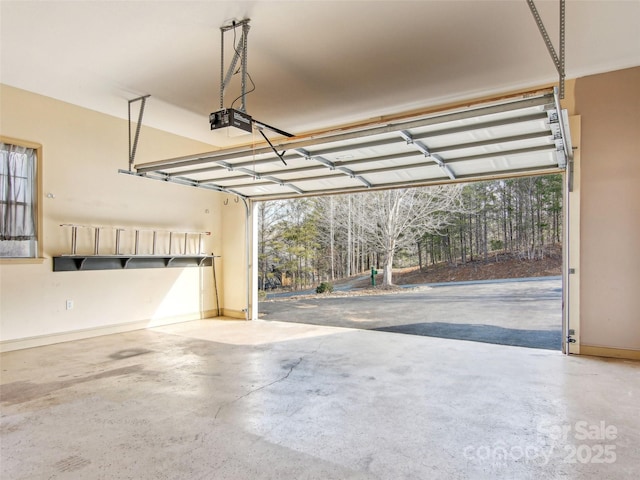 garage featuring a garage door opener