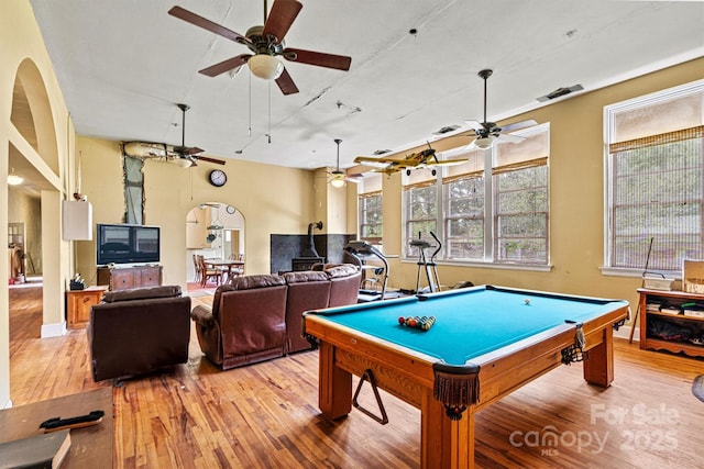 recreation room with billiards, ceiling fan, and light hardwood / wood-style flooring