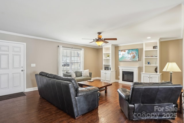 living room featuring ornamental molding, ceiling fan, and dark hardwood / wood-style flooring