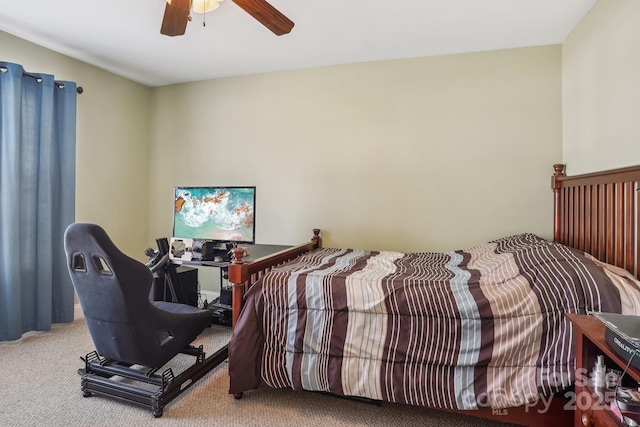 bedroom with ceiling fan and carpet flooring