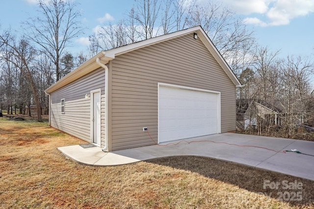 garage with a lawn