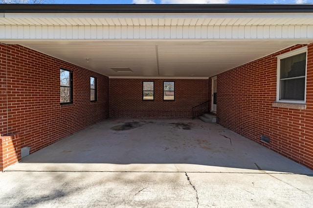 view of parking / parking lot featuring a carport