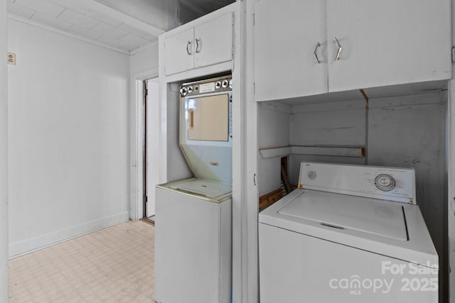 laundry room featuring stacked washer / dryer