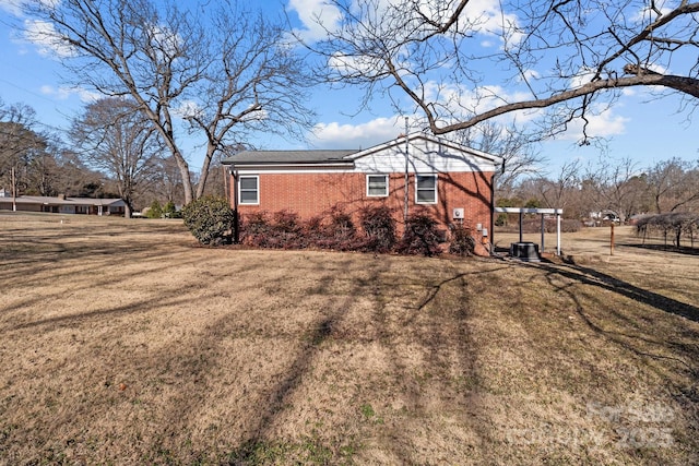 view of property exterior with a lawn