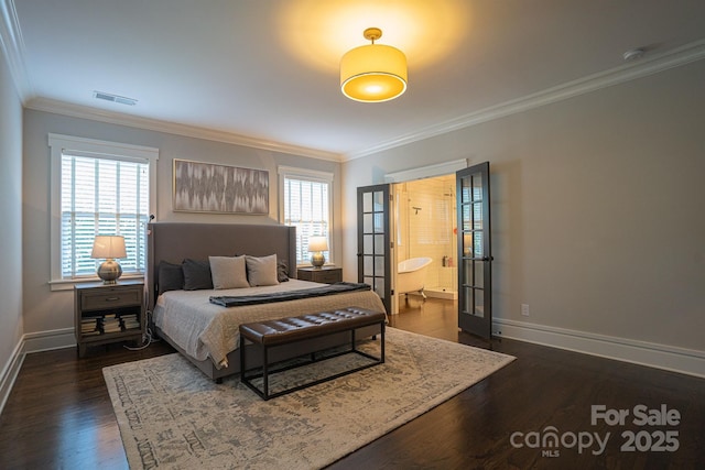 bedroom featuring multiple windows, dark wood-type flooring, and ornamental molding