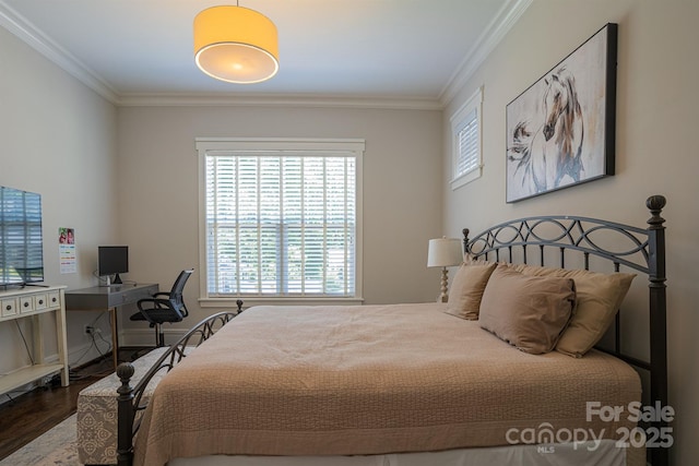 bedroom with ornamental molding and wood-type flooring