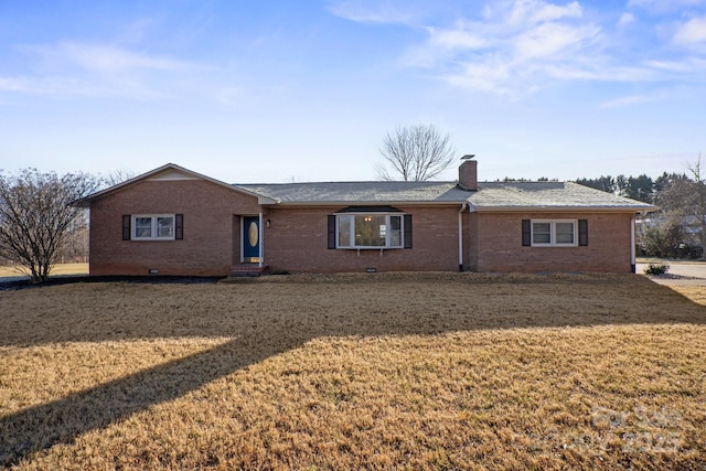 ranch-style home featuring a front yard