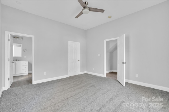 unfurnished bedroom featuring ceiling fan and carpet