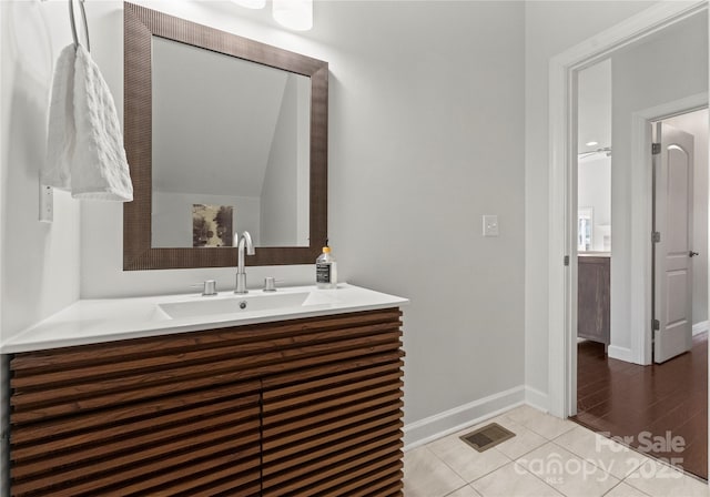 bathroom featuring vanity and tile patterned flooring