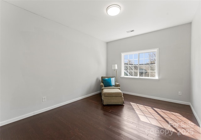 unfurnished room with dark hardwood / wood-style floors