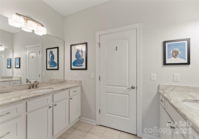 bathroom with vanity and tile patterned floors