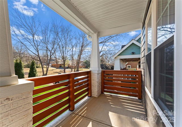 balcony featuring a porch