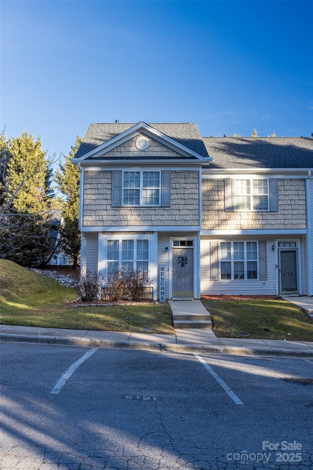 view of front of home with a front yard