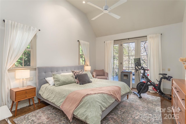 bedroom featuring access to exterior, hardwood / wood-style floors, high vaulted ceiling, and ceiling fan