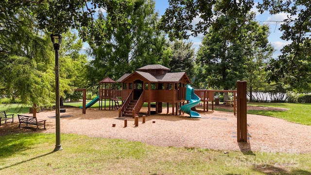 view of playground featuring a yard