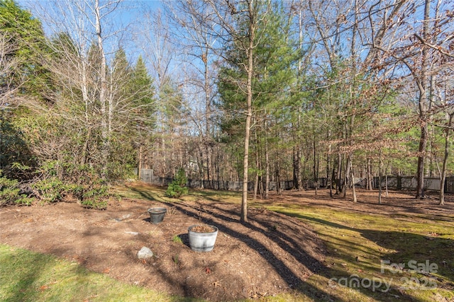 view of yard with fence