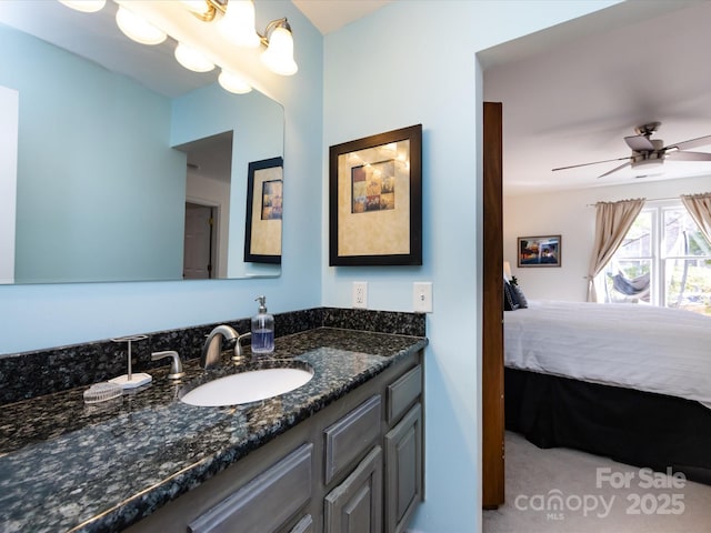 bathroom featuring vanity and ceiling fan