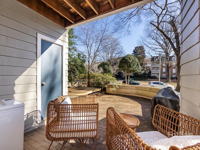 view of patio with a grill