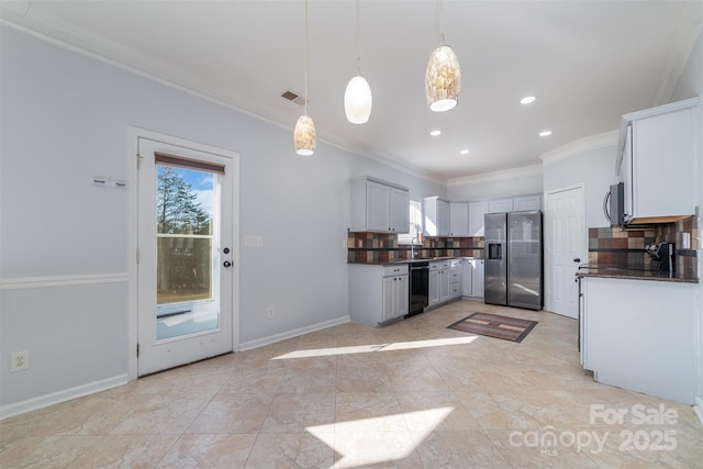 kitchen with tasteful backsplash, sink, hanging light fixtures, ornamental molding, and stainless steel appliances