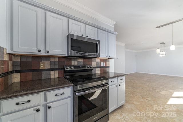 kitchen featuring crown molding, white cabinetry, backsplash, dark stone countertops, and stainless steel appliances