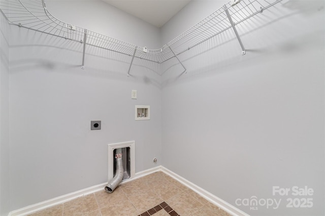 laundry area with hookup for a washing machine, gas dryer hookup, and electric dryer hookup