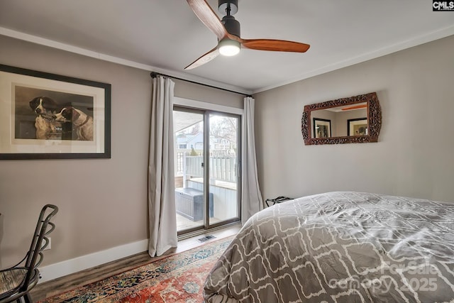 bedroom featuring crown molding, ceiling fan, hardwood / wood-style floors, and access to outside