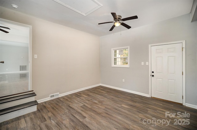 unfurnished room featuring dark hardwood / wood-style flooring and ceiling fan