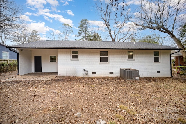 back of property with a patio and central air condition unit