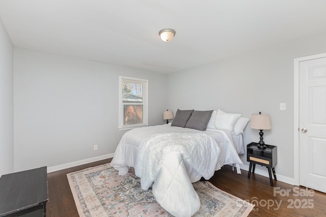 3843 Foxford Pl, Charlotte, NC 28215 - bedroom with baseboards and wood finished floors