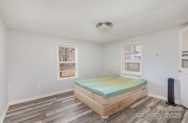 bedroom featuring hardwood / wood-style flooring