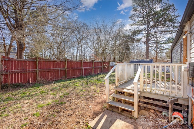 view of yard featuring a wooden deck