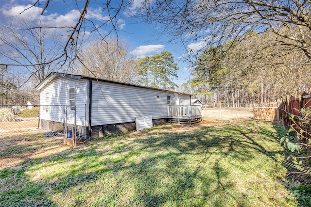 view of yard featuring a deck