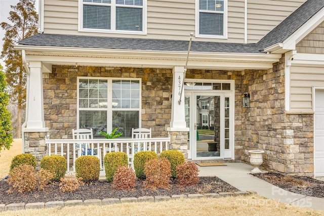 entrance to property with a porch