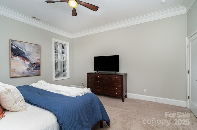 bedroom with ceiling fan, light carpet, visible vents, baseboards, and ornamental molding