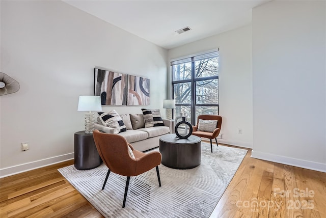 living room with hardwood / wood-style flooring