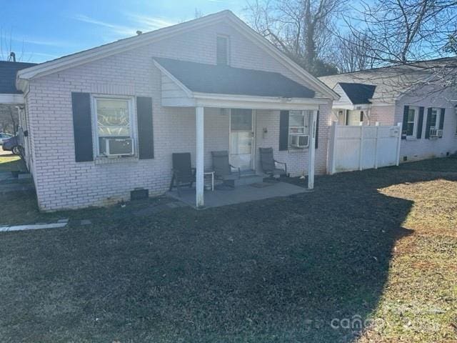 3516 The Plz, Charlotte, NC 28205 - rear view of property with brick siding, a patio, and cooling unit