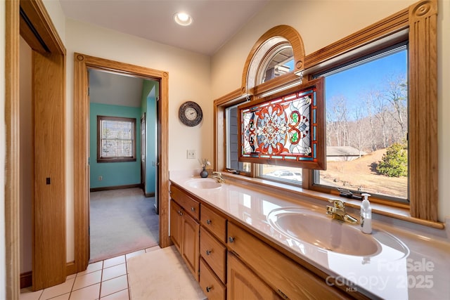 bathroom with vanity and tile patterned flooring