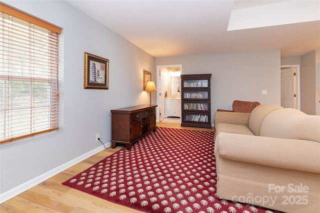 210 State St, Asheville, NC 28806 - living room with plenty of natural light and light wood-type flooring