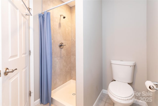 210 State St, Asheville, NC 28806 - bathroom featuring tile patterned flooring, toilet, and a shower with shower curtain
