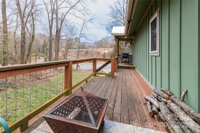 210 State St, Asheville, NC 28806 - wooden terrace featuring an outdoor fire pit