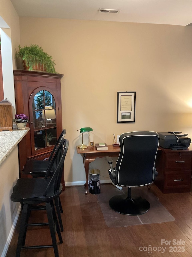 office space featuring dark hardwood / wood-style flooring