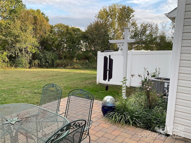 view of patio with cooling unit