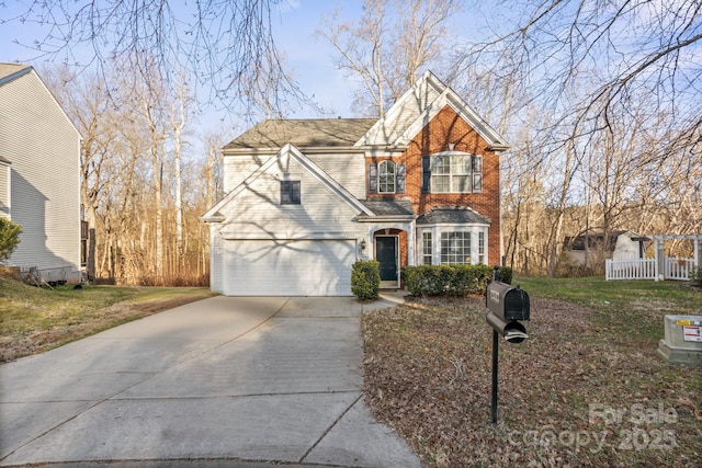 front of property with a garage