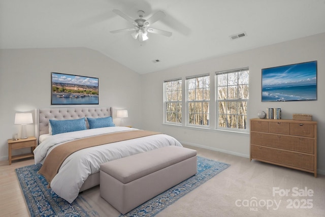 bedroom featuring ceiling fan and vaulted ceiling