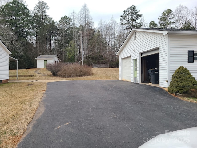 garage with a lawn