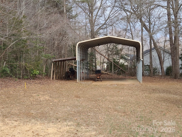 view of yard featuring a carport