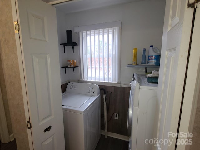 washroom with independent washer and dryer