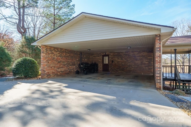 exterior space with a carport