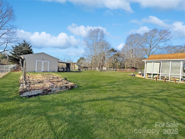 view of yard with an outdoor structure