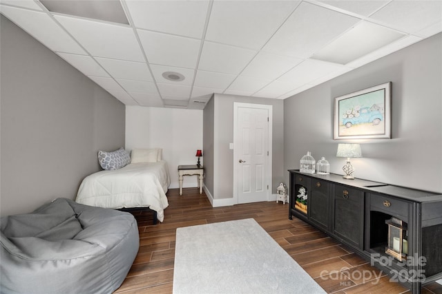 bedroom with a paneled ceiling